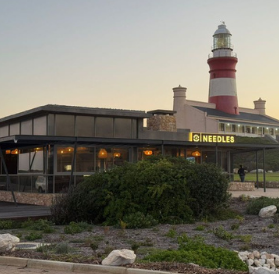 Needles Kitchen restaurant exterior with lighthouse