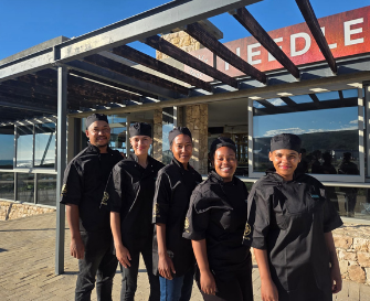 Kitchen team outside the restaurant