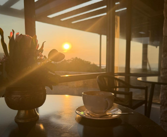 Sunset over a table with coffee